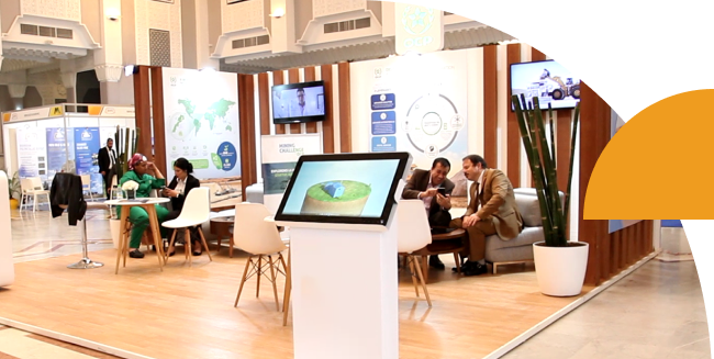 Buyers and suppliers meeting on an exhibition floor Buyers and suppliers meeting on an exhibition floor